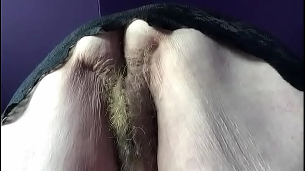 Granny shows hairy pussy